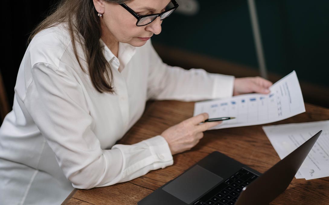 School principal reviewing documents